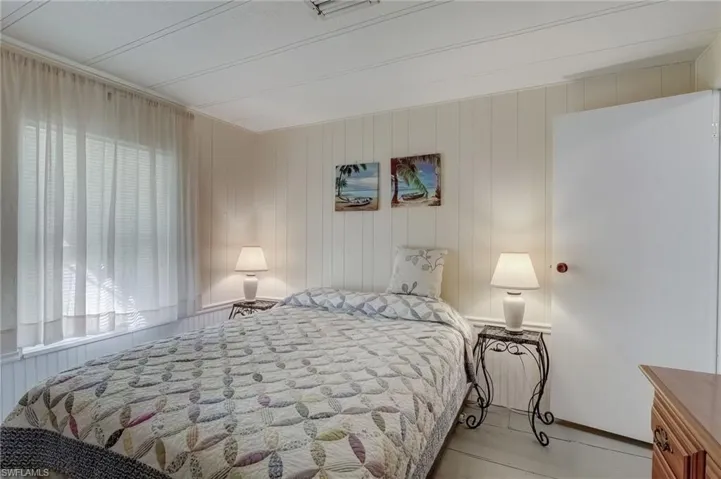 2nd Bedroom with wooden walls