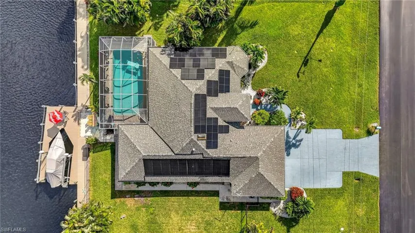 Triple lot with side yard fenced for pets.
