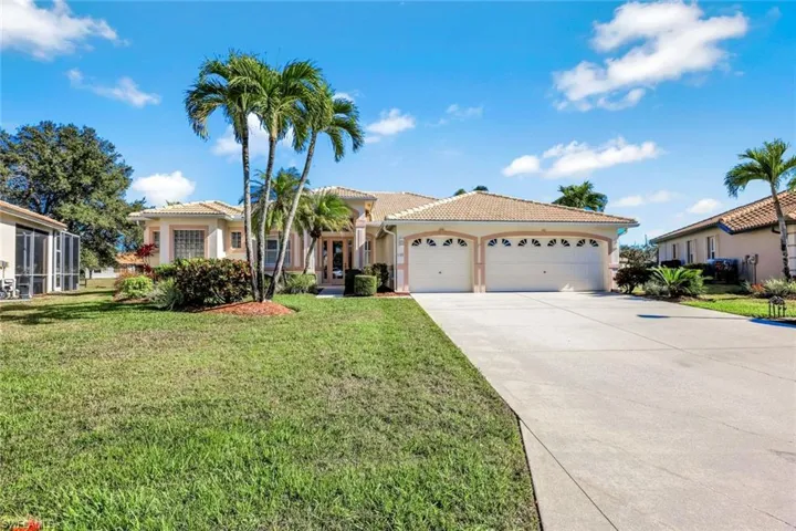 598 Grand Rapids Blvd is located on a lakeview cul de sac, in Waterways Of Naples 34120