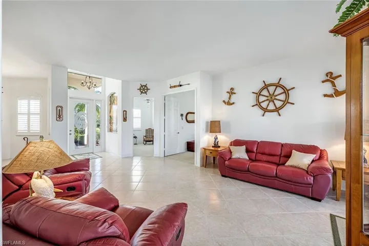 entryway, and second living area, opens to screened lanai