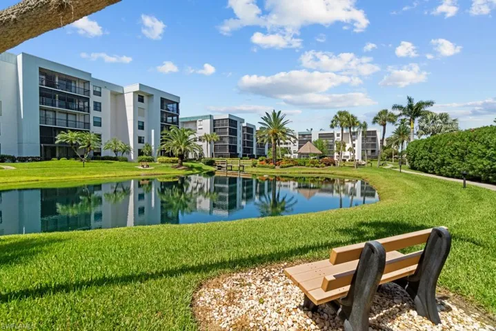 View of home's community with a gazebo and a water view