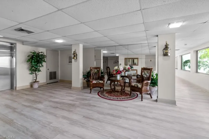 Common area featuring a paneled ceiling