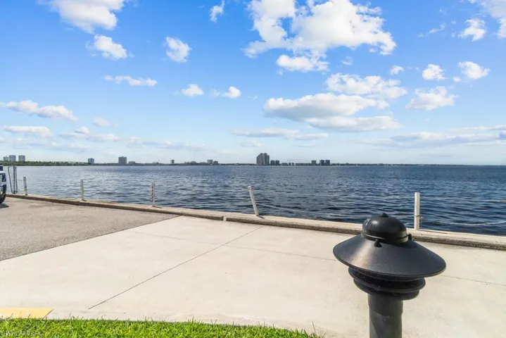 Dock featuring a water view