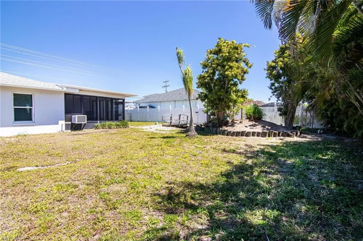 Large backyard is fenced with side entry gate!