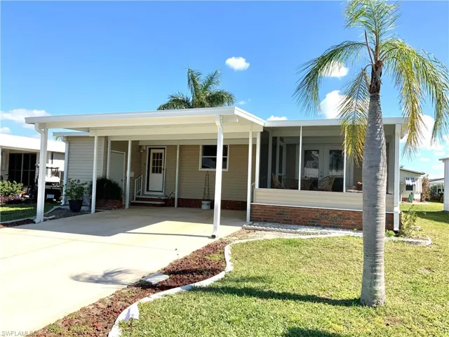 Front Elevation & Long Driveway