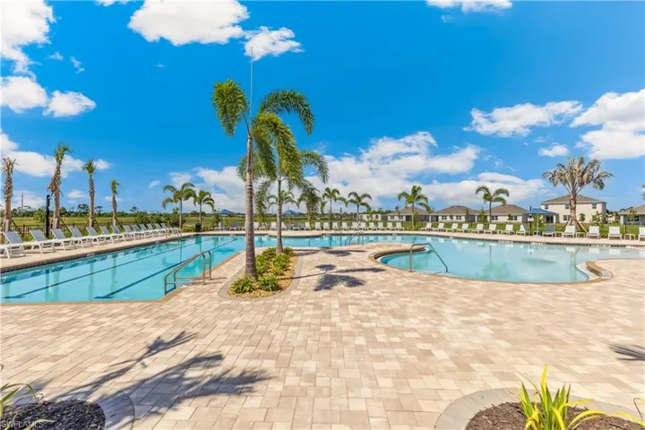 Community pool featuring a patio area
