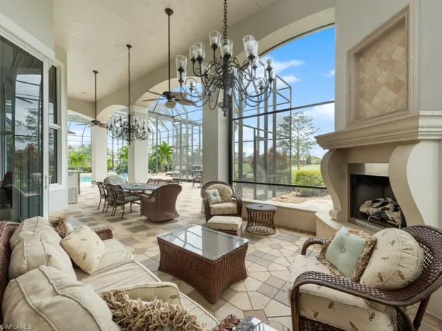 Sunroom with an inviting chandelier