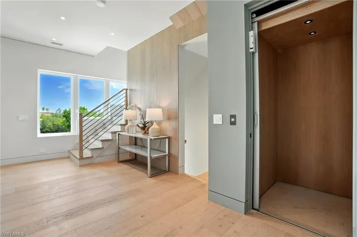 Elegant entry way and elevator- Virtually Edited Image