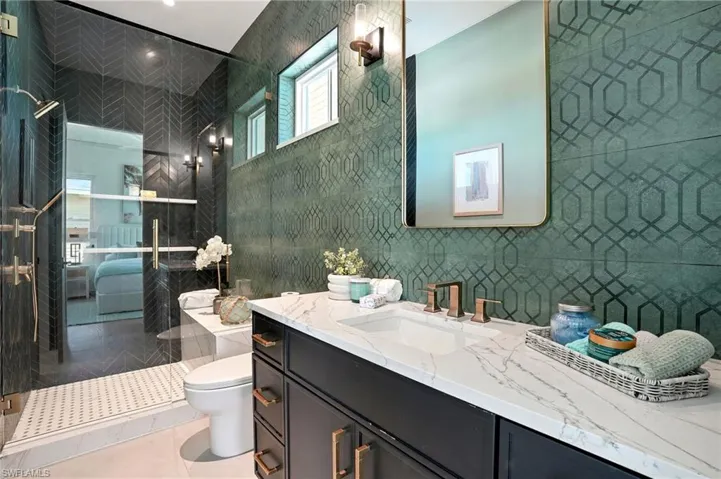 Luxury finishes in guest bath- virtually edited image
