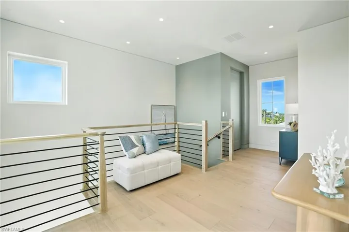 Bright and airy upstairs hallwayVirtually Edited Image