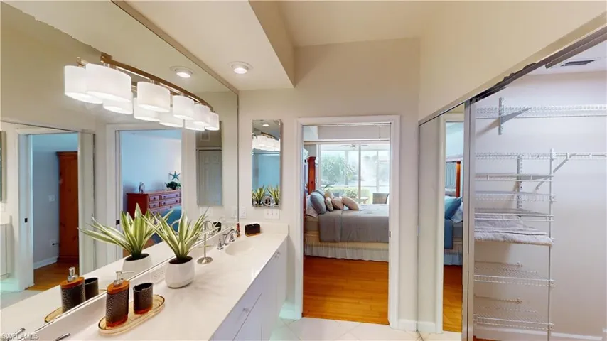 Bathroom with vanity and hardwood / wood-style floors
