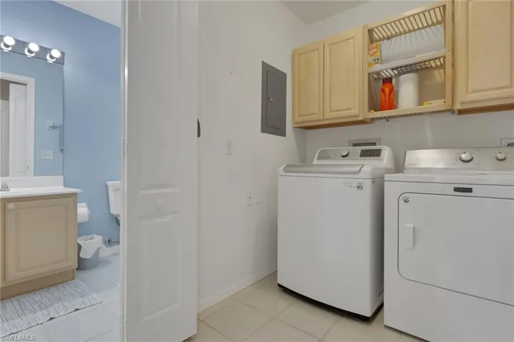 Deep laundry area with electric panel