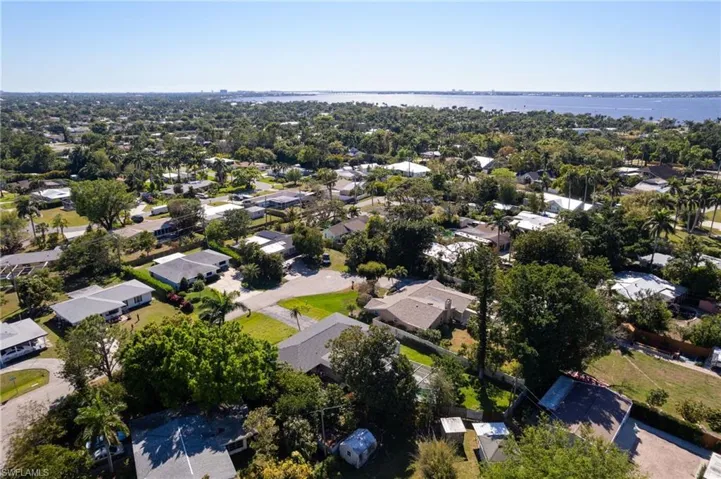 Bird's eye view with a residential view and a water view