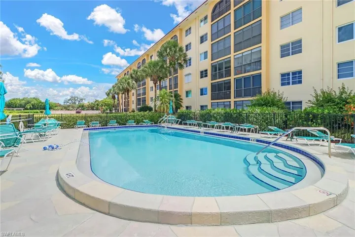 Pool in front of building, one of six in complex.