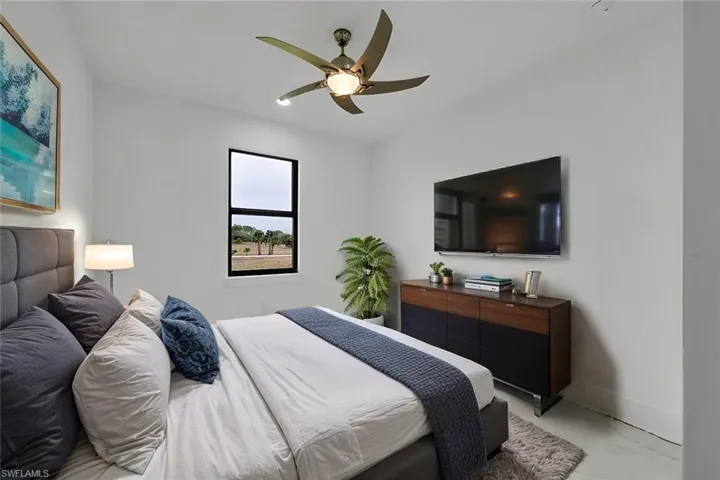 Bedroom featuring ceiling fan