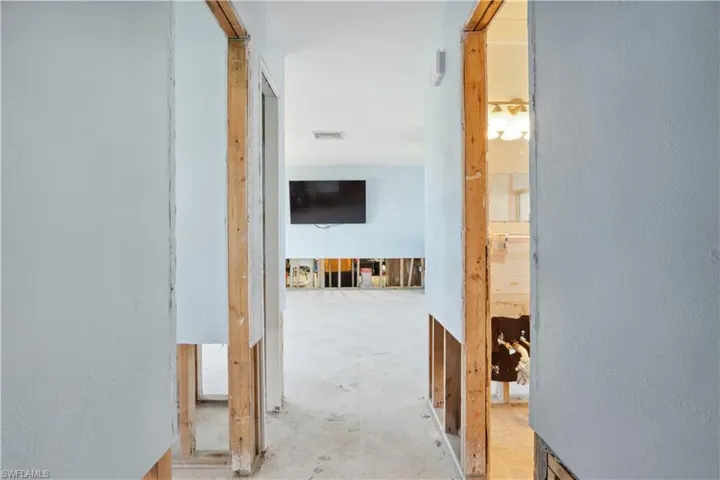 Bedroom/bathroom hallway looking towards living room