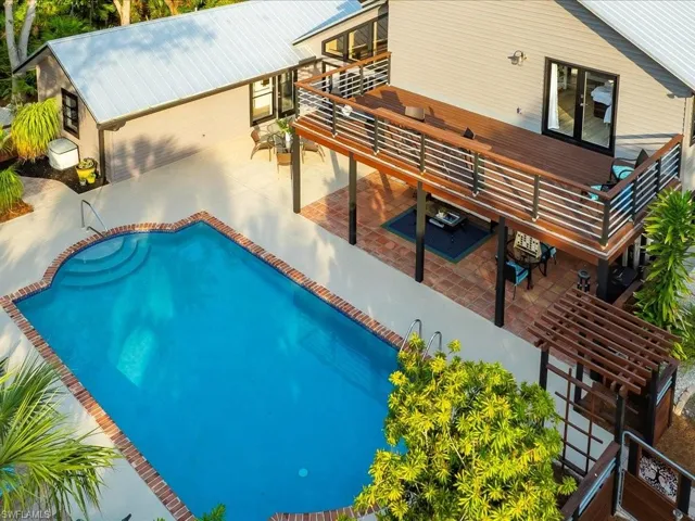 Outdoor pool with a patio area