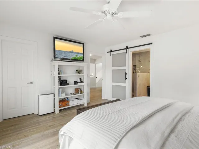 Bedroom with door to bathroom