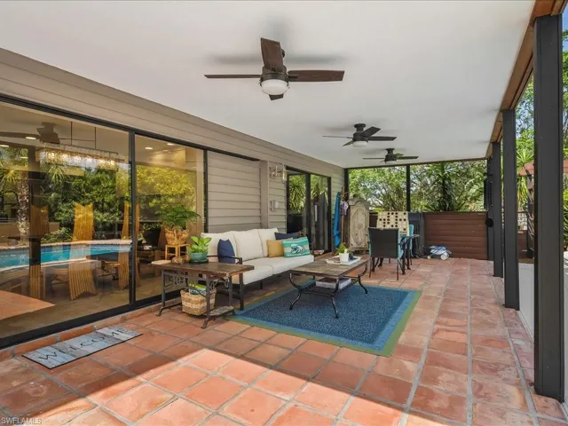 View of patio featuring ceiling fan, an outdoor hangout area, and outdoor dining area