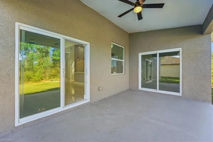 View of patio with ceiling fan