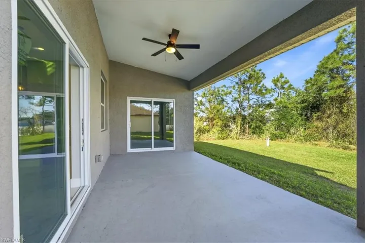 View of patio with a ceiling fan