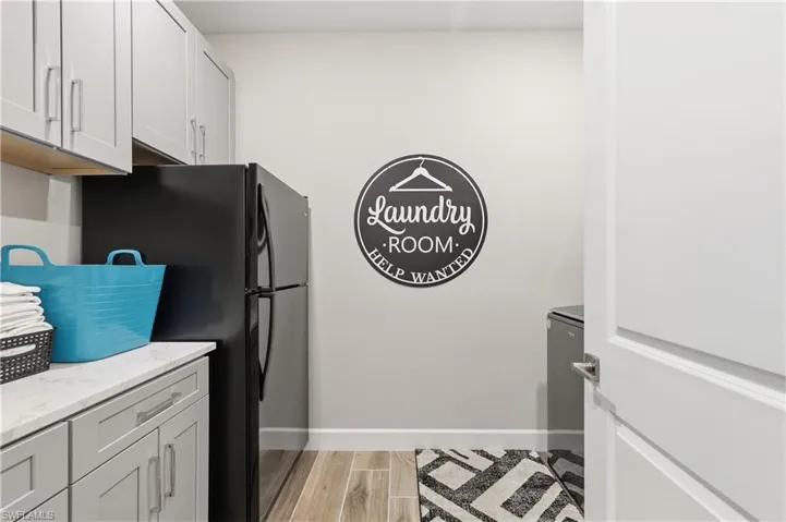 Expansive Laundry w/Optional Cabinets, Counters, & Extra Refrigerator