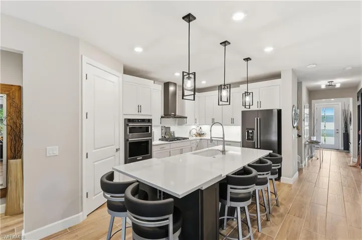 2-Tone White & Flagstone Cabinets, Huge Island, Black Stainless Appliances