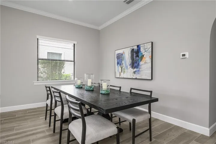 The great room includes a more formal dining space for larger gatherings.