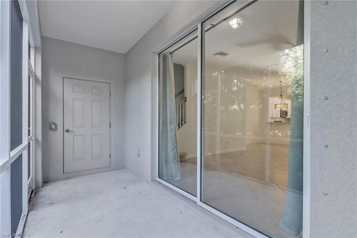 Screened-in Lanai featuring a storage closet.