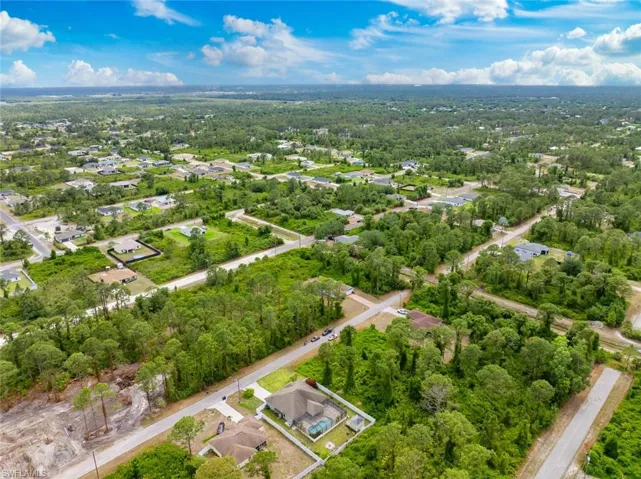 Bird's eye view with a wooded view