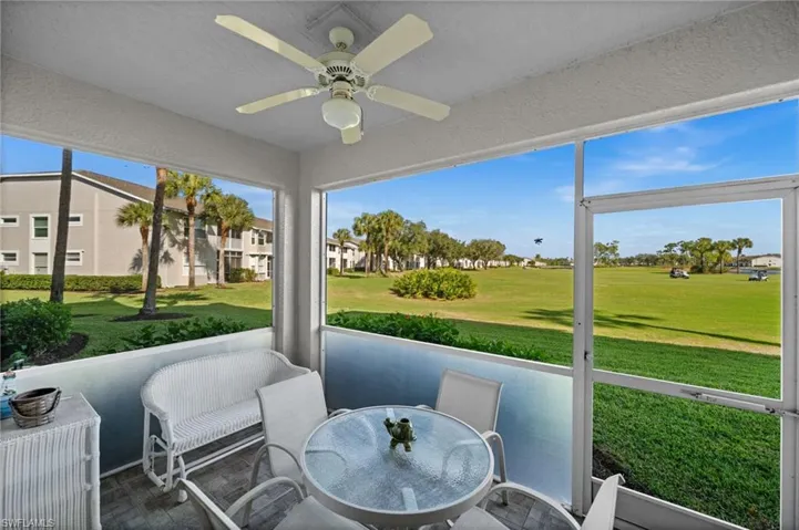View of property's community featuring a yard, a residential view, and golf course view
