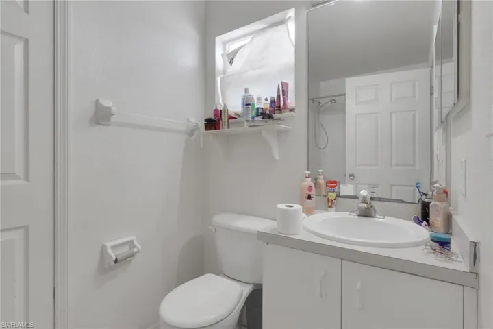 Full bathroom featuring vanity and a shower