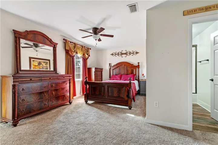 Bedroom with carpet floors and ceiling fan