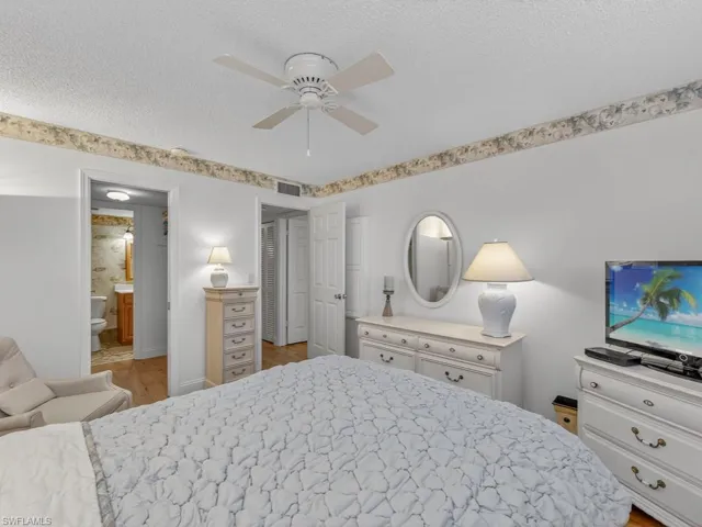 Primary Bedroom with Walk-In Closet and Ensuite Bathroom