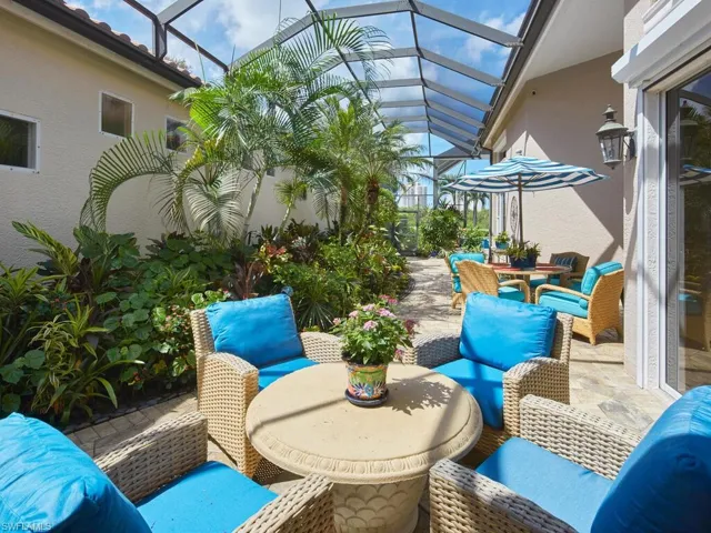 View of patio / terrace featuring glass enclosure