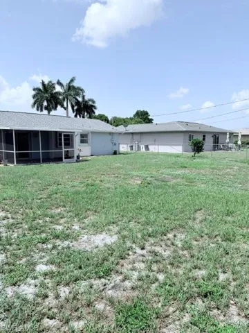Side view of yard from back of house.