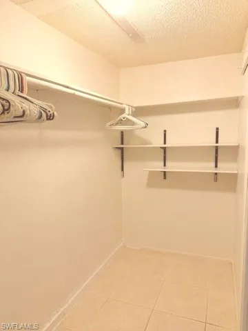 Master bedroom walk in closet right side view.