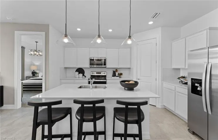 Photos are from a furnished model. Options for this home may vary.