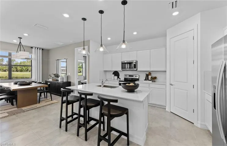 Photos are from a furnished model. Options for this home may vary.