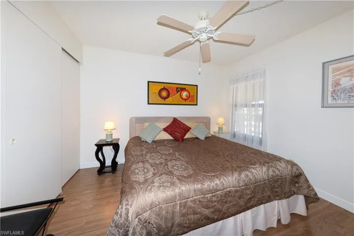 Bedroom featuring a closetand ceiling fan