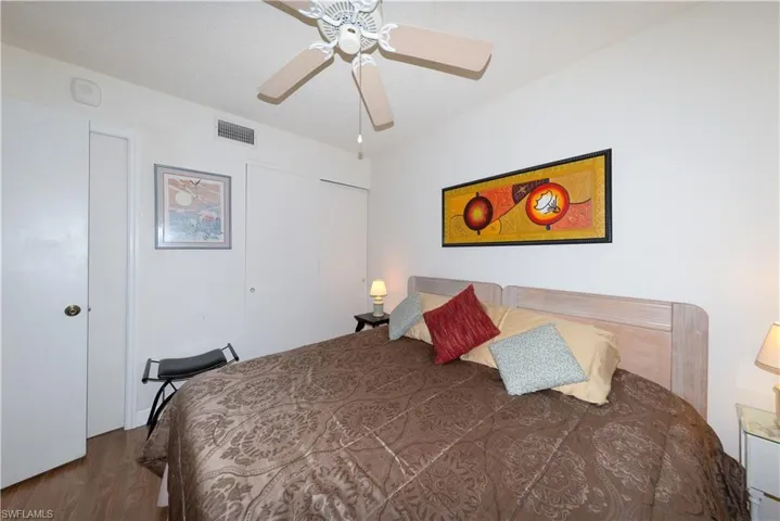 Guest Bedroom with a closet, and ceiling fan