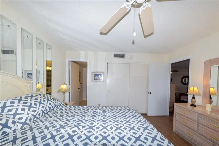 Bedroom with a closet and a ceiling fan