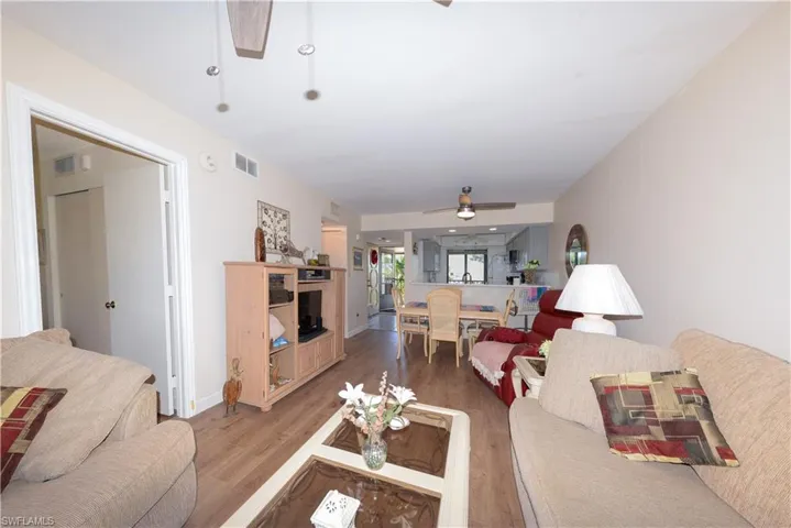 Living room featuring a ceiling fan