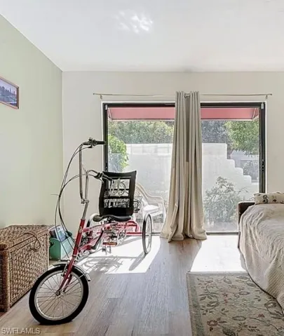 Bedroom featuring wood finished floors