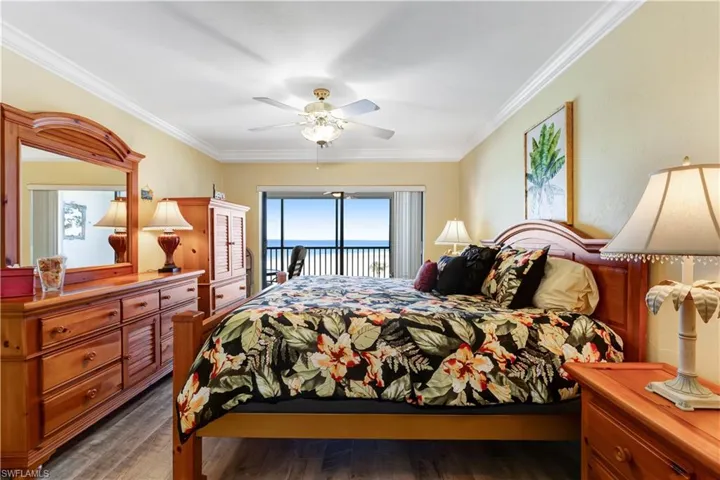 Spacious Primary Bedroom featuring private access to Gulf front lanai