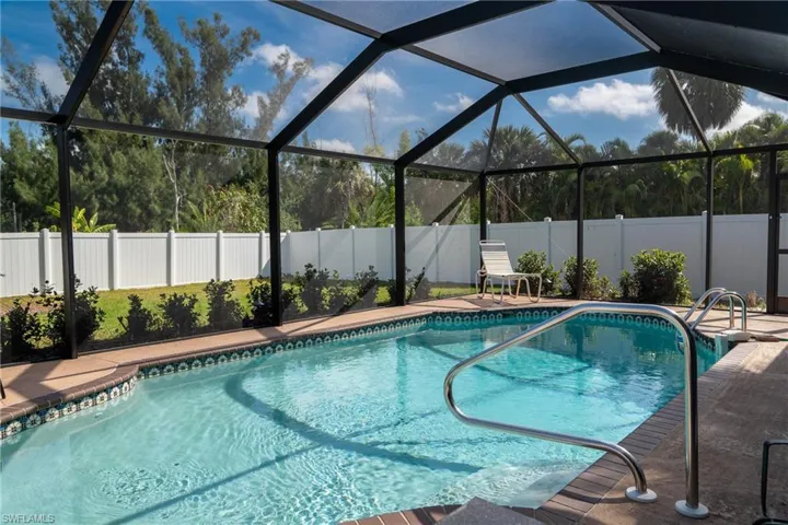View of pool featuring a fenced backyard, a fenced in pool, and a patio