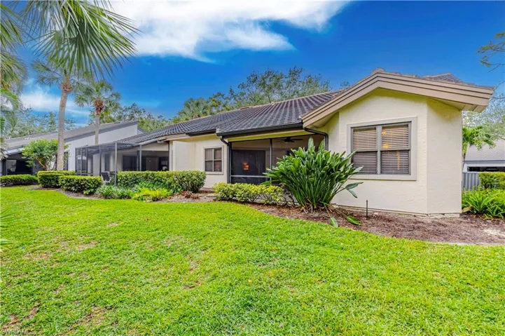 Single story home featuring a rear yard