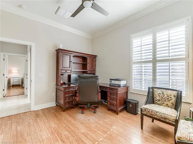 Plantation shutters and beautiful flooring in bedroom 3