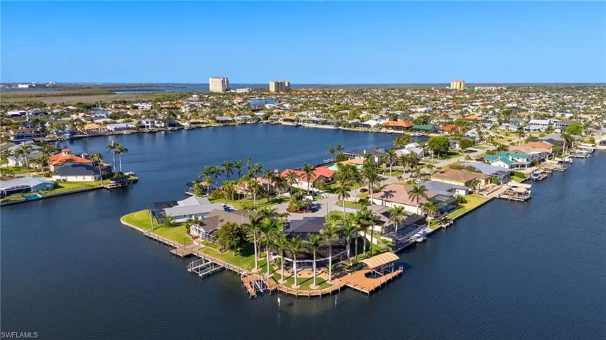 Aerial view with a water view and a residential view