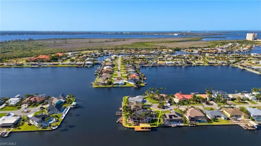 Aerial view with a water view and a residential view